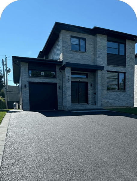 Residential asphalt driveway installation
